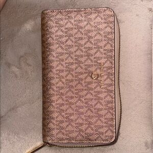 MICHAEL Michael Kors Brown Wallet with Monogram Pattern and Gold Hardware